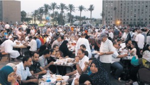 Muslims and Christians gather at Tahrir Square for Ramadan Meal