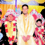 Gani Ansari (centre, in yellow), at the wedding of his blood brother Ram Narayan (centre, in wedding dress)