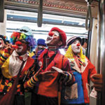 Muslim Clowns Collect Money for Charity on Passenger Train in Malaysia