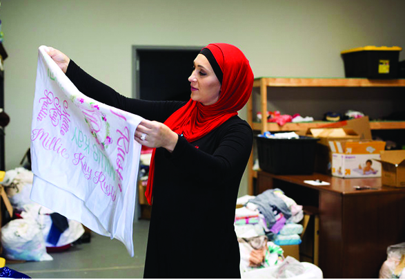 Bosnian Muslim Serves US  City that Welcomed Her
